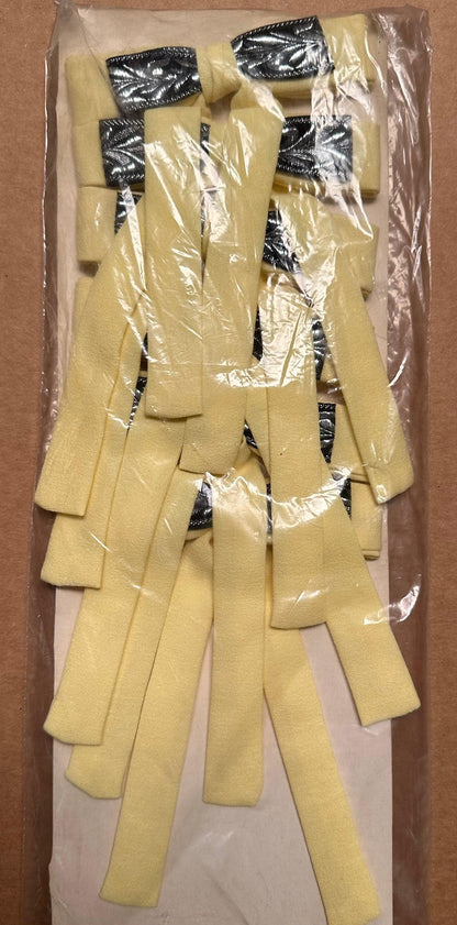 The Colonel Ties by Square Up Fashions feature a striking combination of yellow ribbon strips with black bands, all wrapped in clear plastic packaging on a cardboard background. These are perfect for adding a western flair to any outfit.