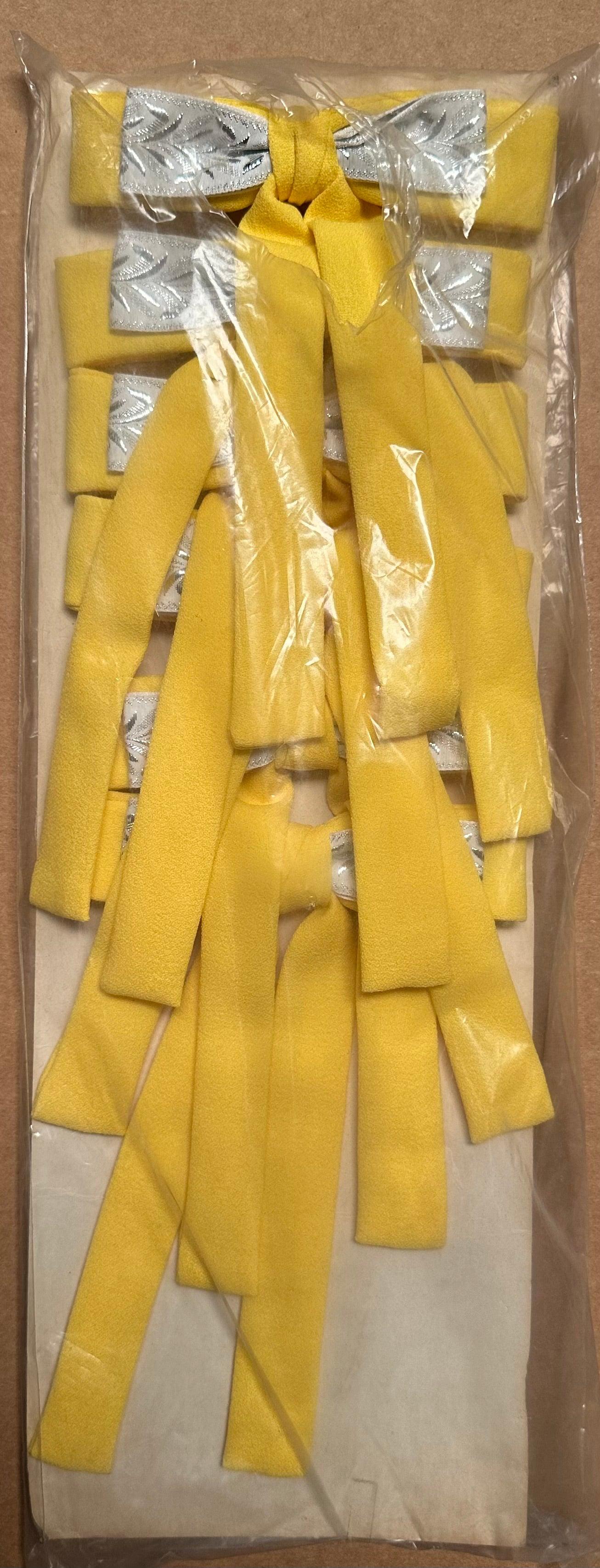 Colonel Ties by Square Up Fashions, resembling a southern bow tie, are neatly tied and stacked in a plastic package.