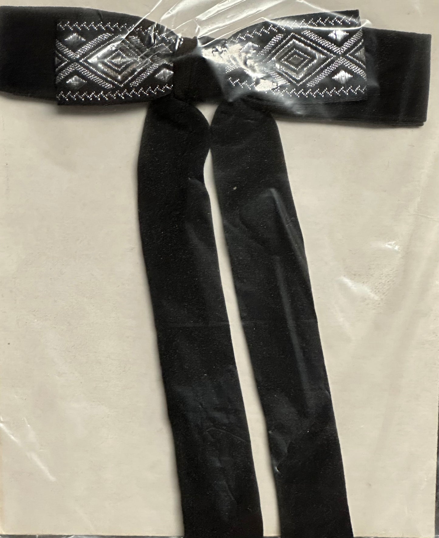 Colonel Ties by Square Up Fashions feature a black background adorned with embroidered geometric patterns, ideal for creating a western-inspired look.