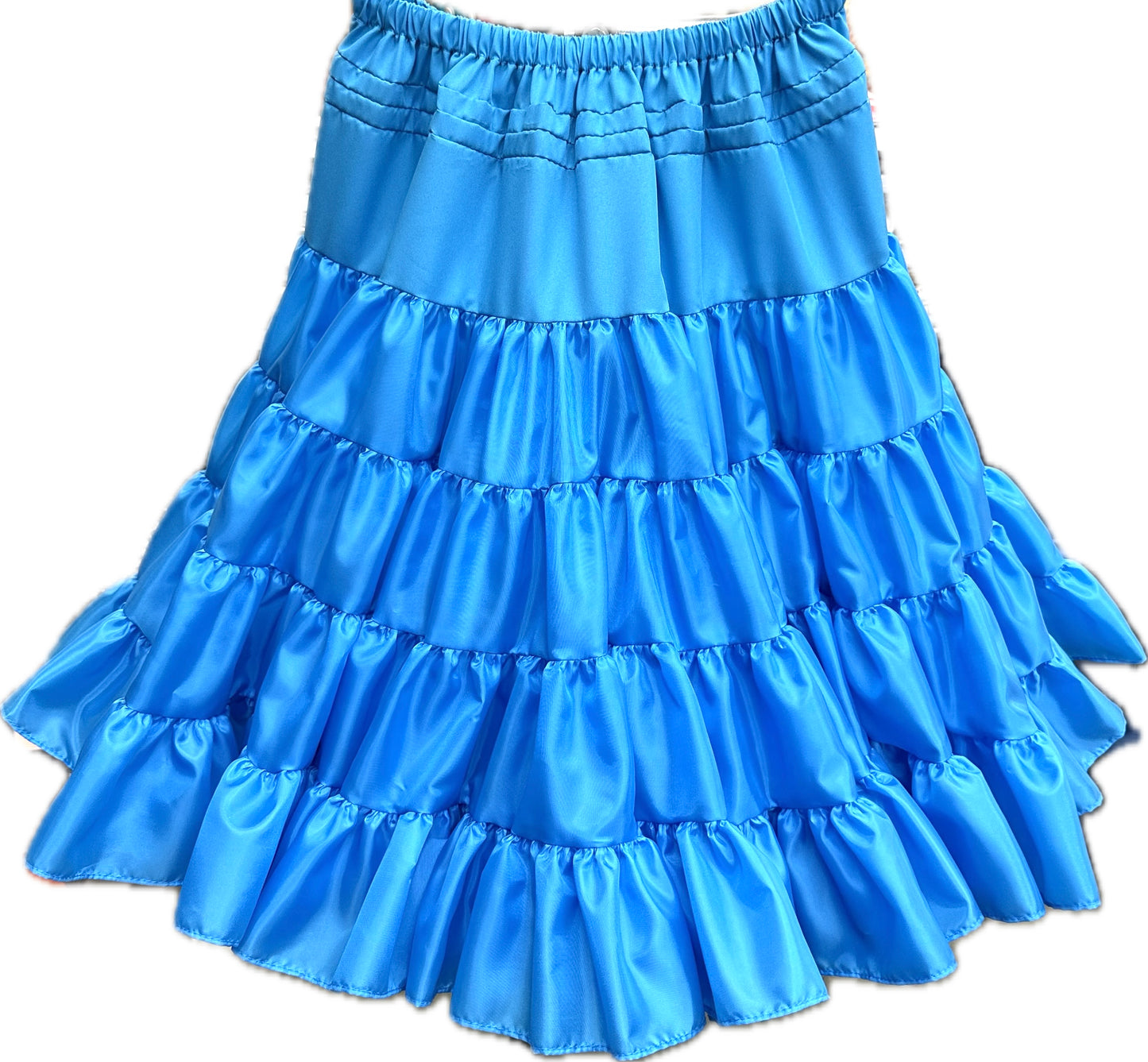 Square Up Fashions presents the Soft Poly-Liner Petticoat, a vibrant blue satin skirt adorned with ruffles and an elastic waistband, ideal for square dancing. Made from 100% polyester, it features an adjustable slip length for enhanced versatility.