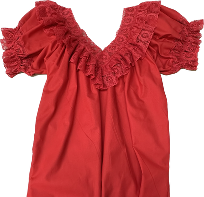 An Fiesta V-Neck Blouse from Square Up Fashions with ruffles on it.