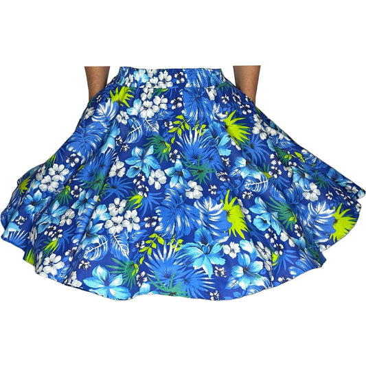 A person wearing a Tropical Hawaiian Square Dance Skirt by Square Up Fashions.