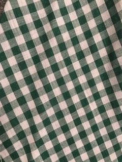 A CLEARANCE Gingham Scarf Ties 1/4", in green and white, placed on a table. (Brand: Square Up Fashions)